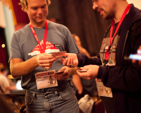 Attendees trading cards